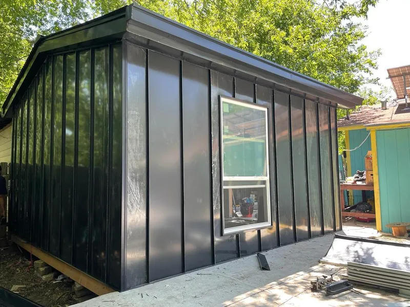 Black standing seam metal wall panels for Metal Roof Installation in Orange Cove