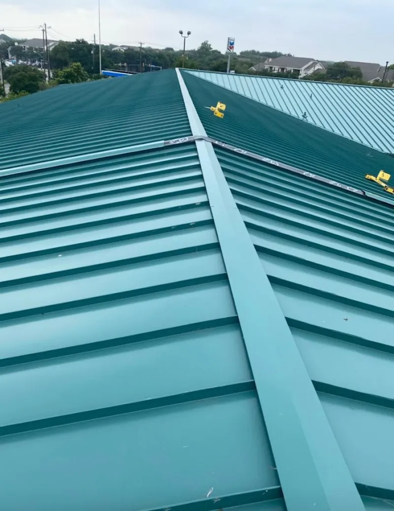 Green commercial metal roof ridge and valley for Metal Roof Repair in Orange Cove